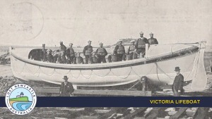 1912 postcard featuring a photo of the Victoria Lifeboat crew in Newcastle, Australia.